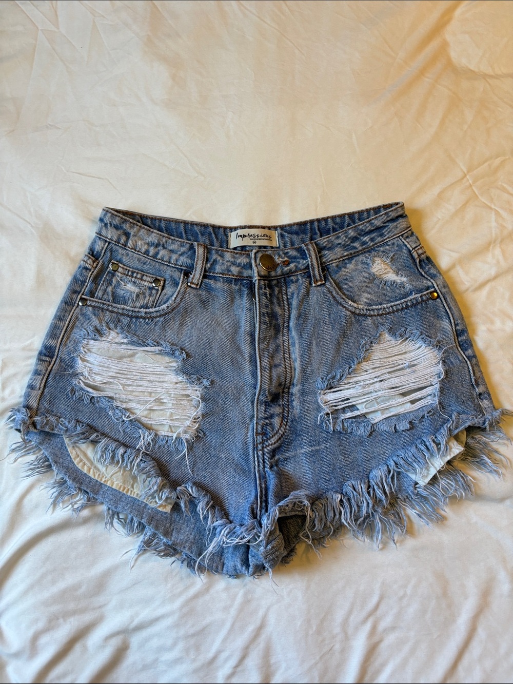 High-Rise Distressed Denim Shorts - Light Blue